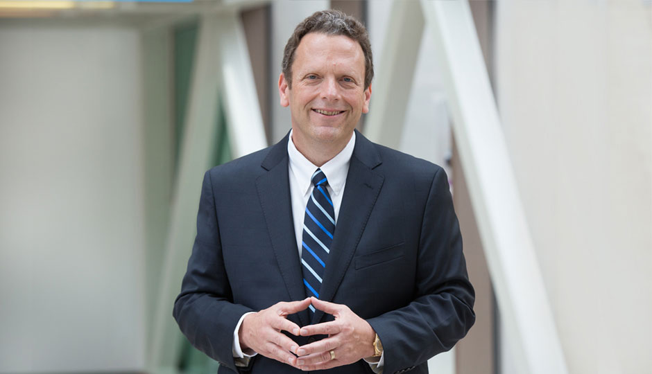 David L. Holmberg, President and Chief Executive Officer