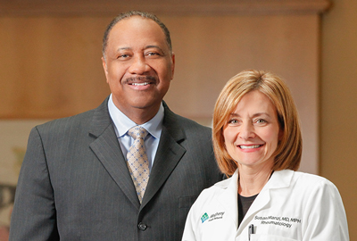 Charles DeShazer, MD, chief medical officer of Highmark Health Plan, and Susan Manzi, MD, chairwoman of AHN's Department of Medicine