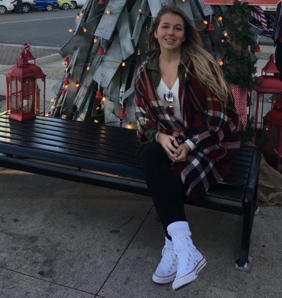 Alyssa Brauckmann sitting on a bench