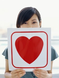 lady with heart sign