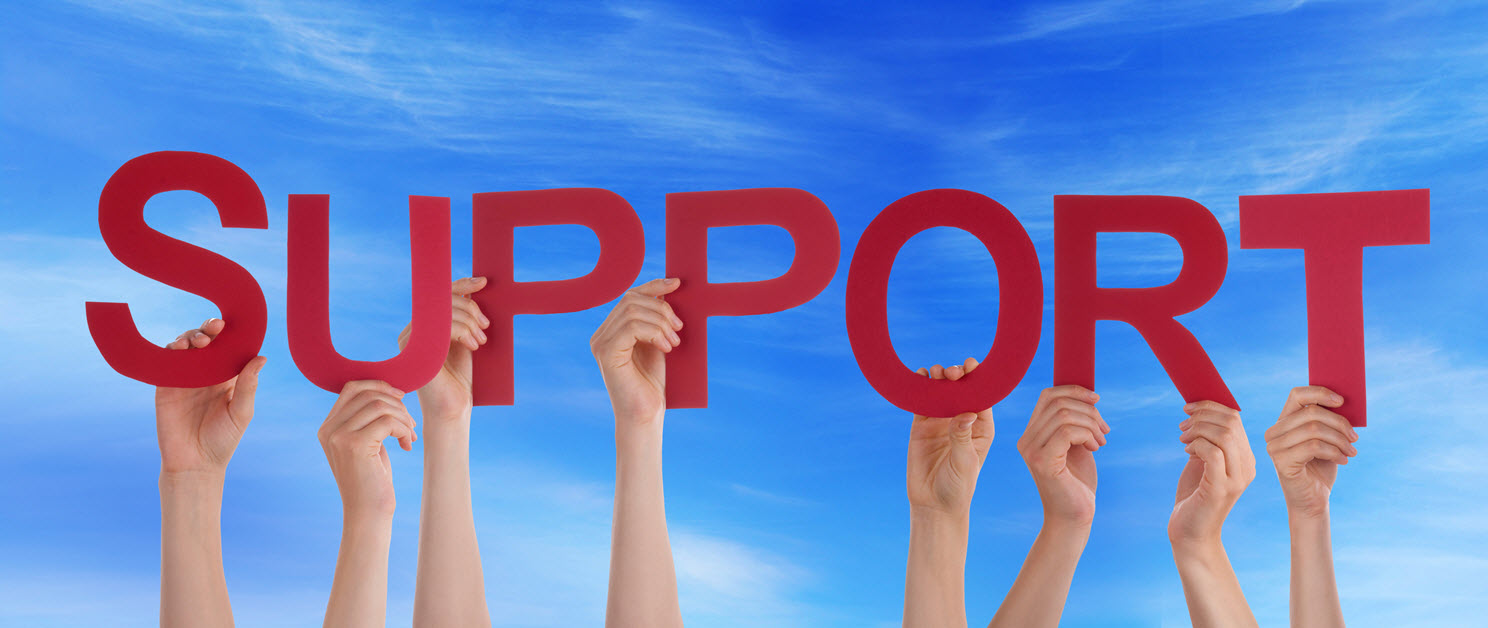 Hands holding up letters to spell the word "support"