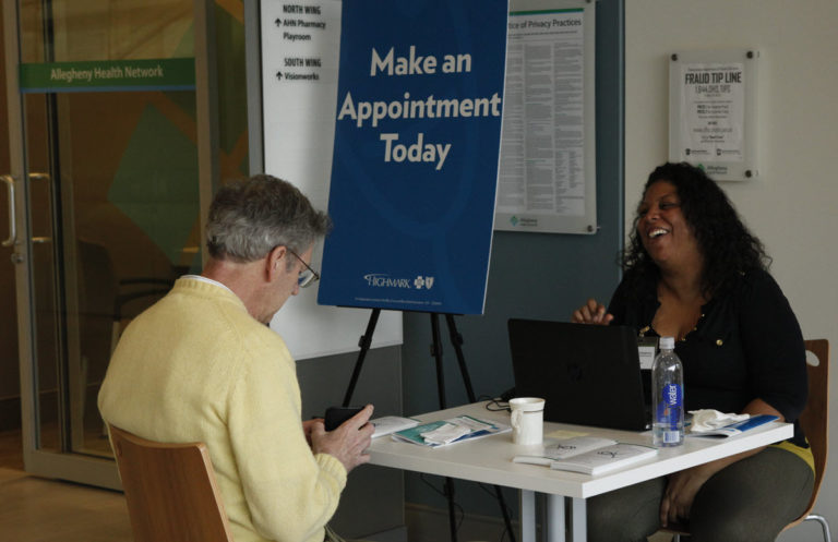 A man with an appointment scheduling professional