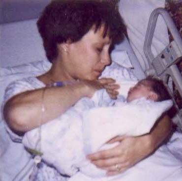 Susan Bevevino holding daughter Olivia
