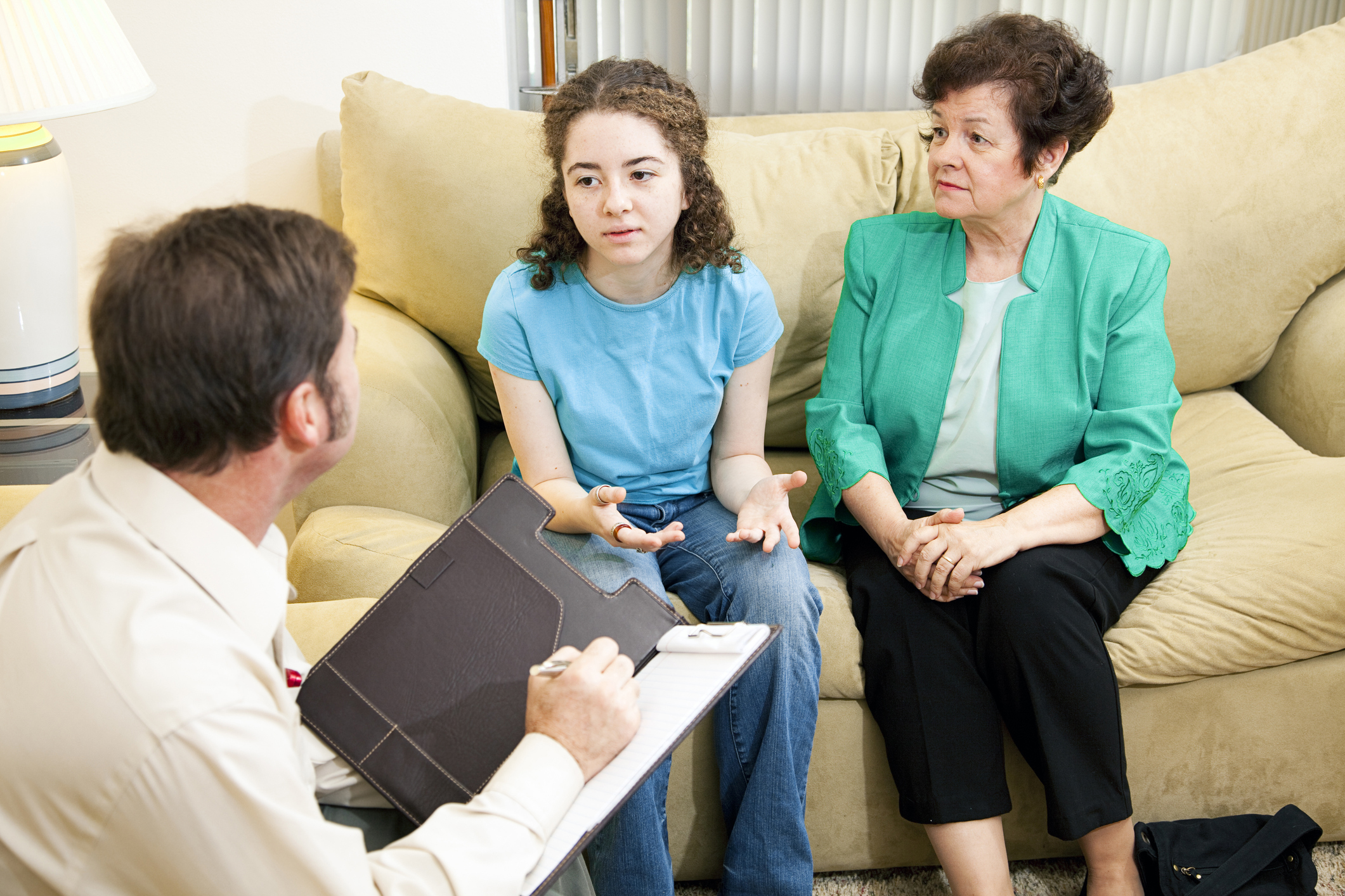 Girl talking to counselor