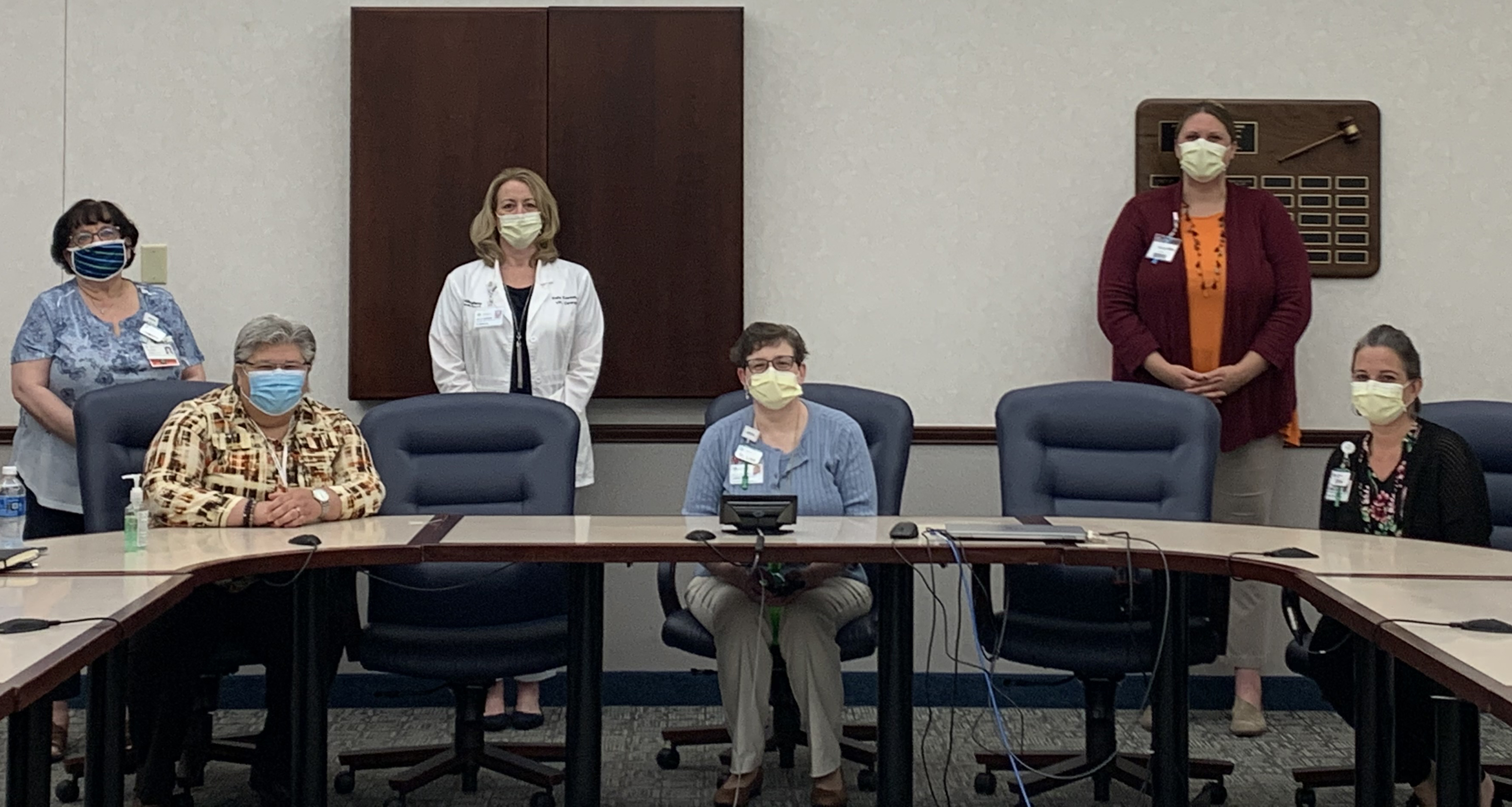 During COVID-19, caregivers supporting each other is more important than ever. Masked and socially distanced, a few attendees from an Employee Caregiver Support Group meeting, left to right: Joanne Cook, Lisa Simon, Kelly Kassab, Sister Lisa Balcerek, Megan Chapman, Erin Joyce.