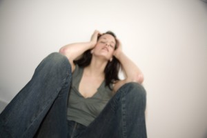 overwhelmed woman sitting