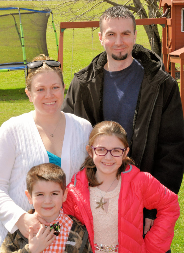 Megan today with her family: husband Don, daughter Lillyanne, and son Daniel