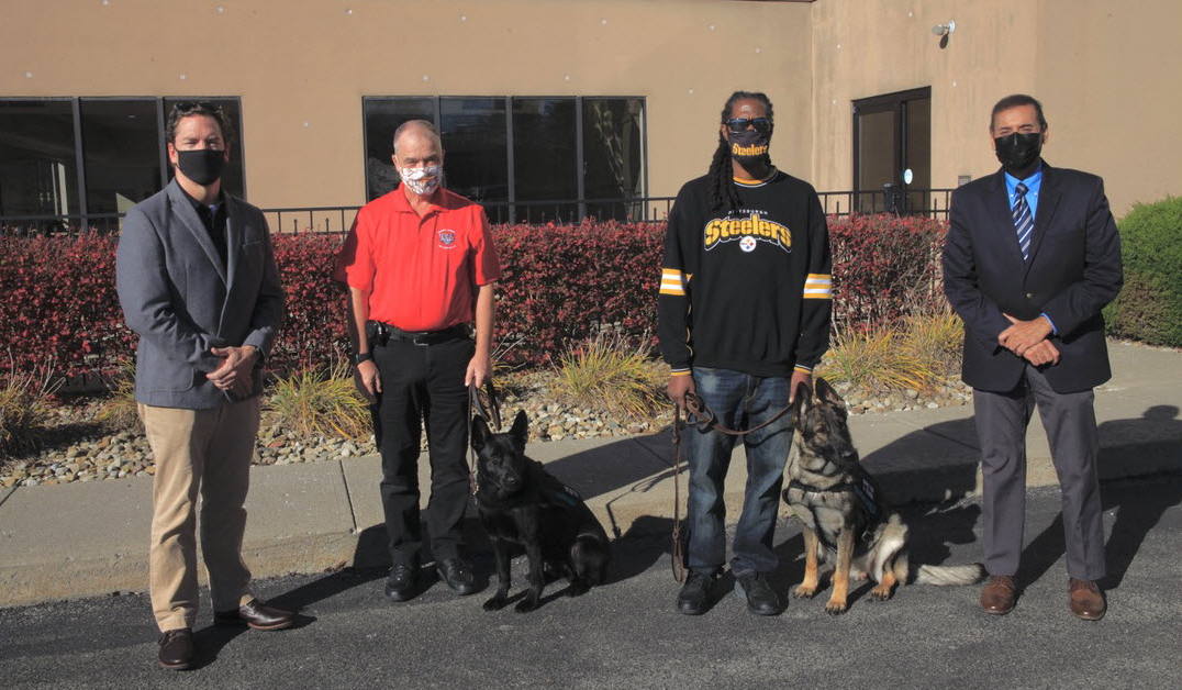 Left to right: Troy Detter, Strategy Analyst, Highmark Health; Dan Smith with Charlie; Shar’Ron Harris with Blue; Kannu Sahni, VP Community Affairs, Highmark Health