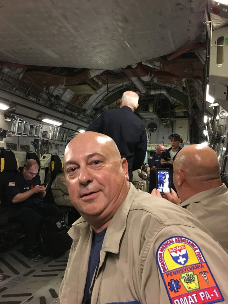 Jim and other DMAT members aboard an Air Force C17