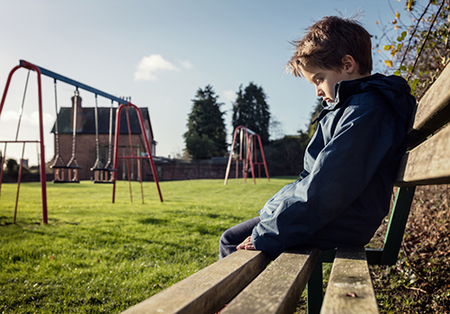 Sad boy on playground