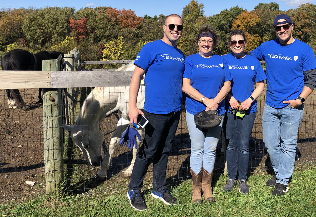 Left to right: Jason Beach, VP, Customer & Market Strategy; Bev Cleland, Manager, Client Implementation; Mandy Zerr, Associate Project Manager; and Aaron Bomba, Document Production Analyst (and author of this article!)