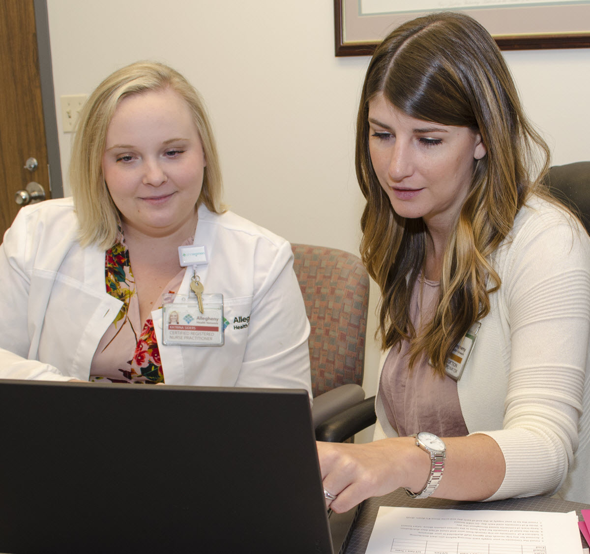 Katrina Siders and Ashley Schultz sharing a computer screen as part of their work with the Perinatal Hope Program