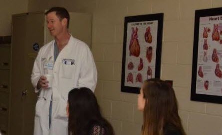 Dr. Stephen Bailey, a cardiac surgeon at AHN, answers questions from students on another observation day