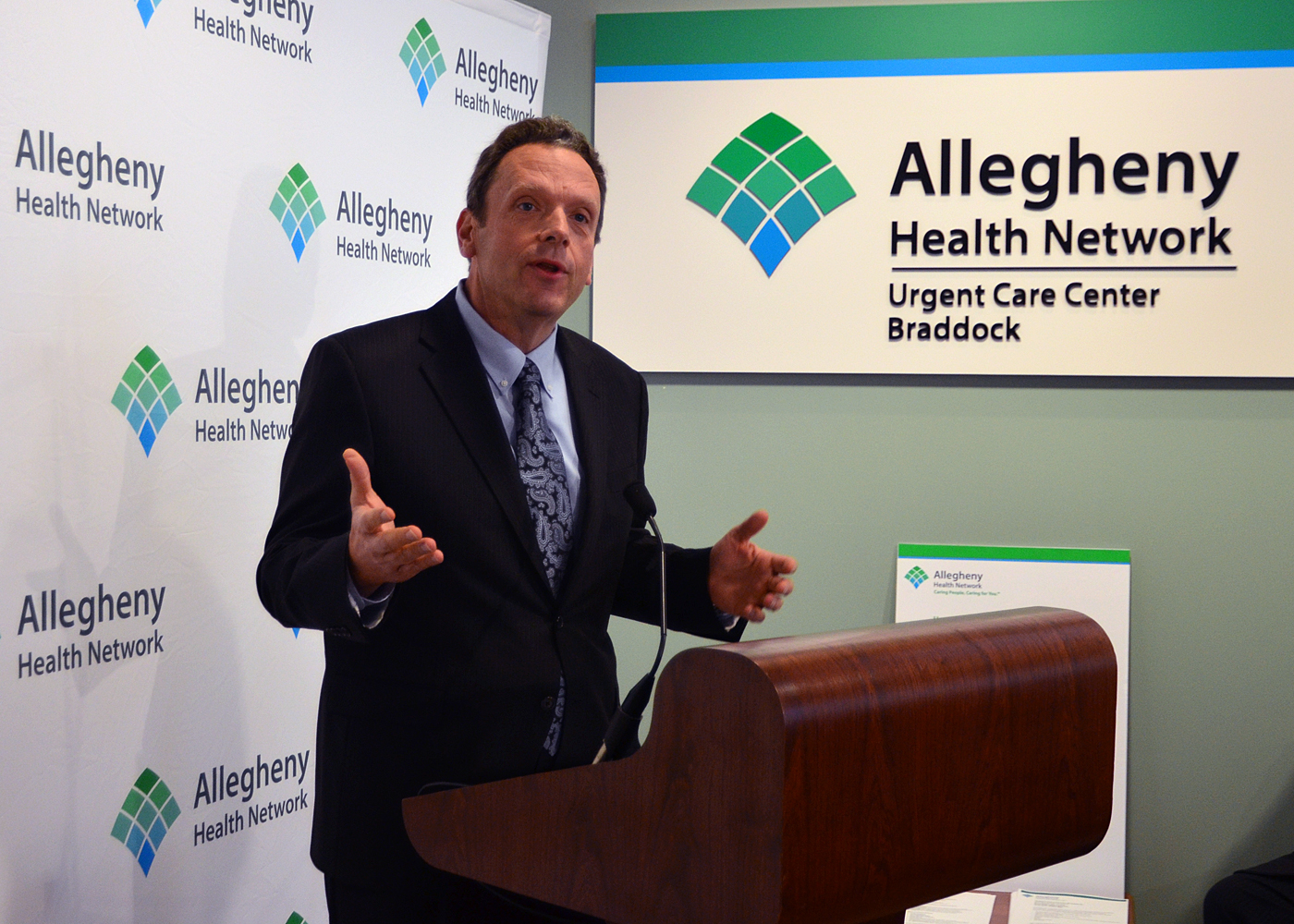 CEO David Holmberg speaking at Allegheny Health Network Urgent Care Center in Braddock