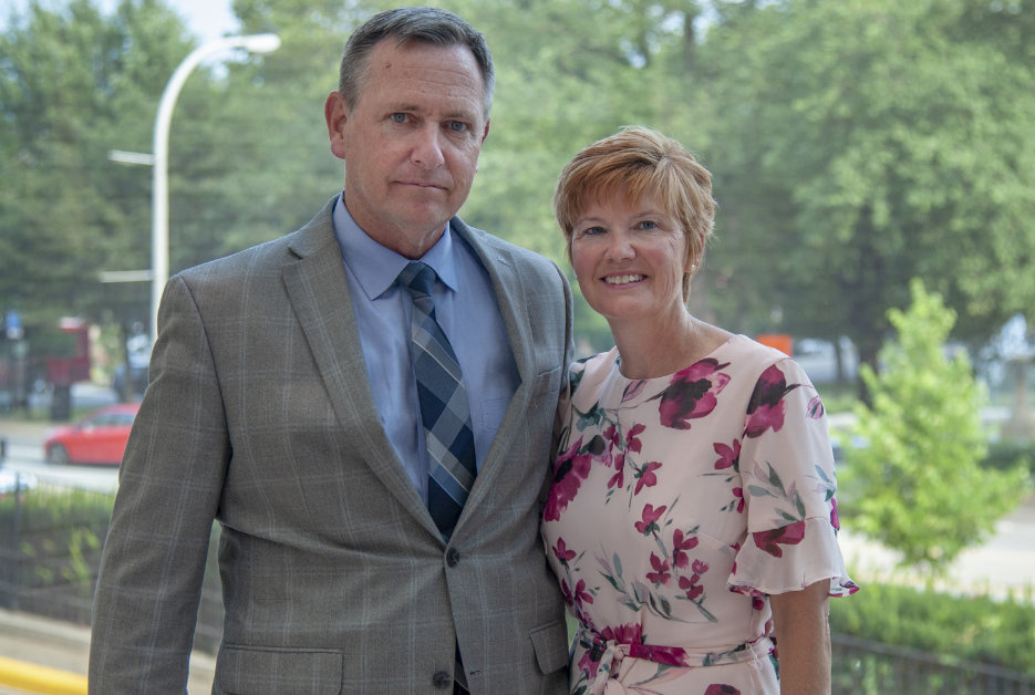 Dr. Bartlett and wife Susan, a nurse practitioner in surgical oncology, outside the AHN Cancer Institute cancer center in Pittsburgh’s North Side neighborhood.