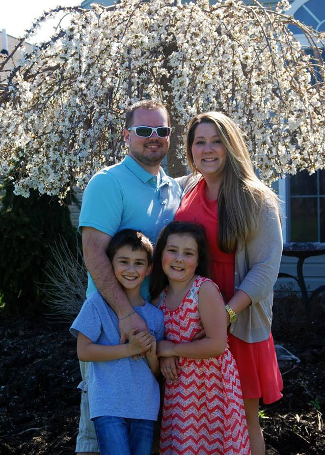 Patrick Simcox with his wife, son and daughter