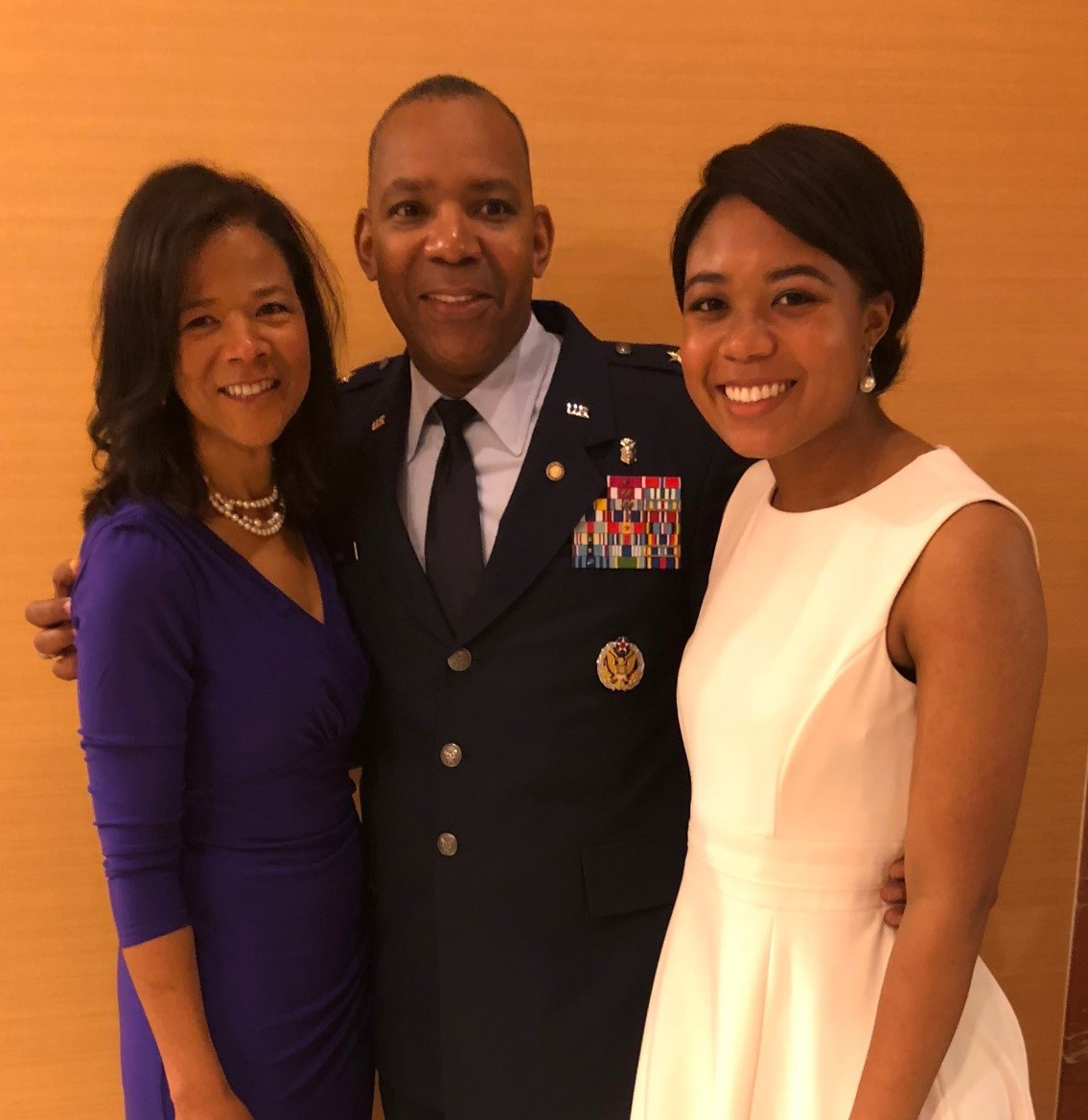 Dr. Allen poses with his wife and daughter. 